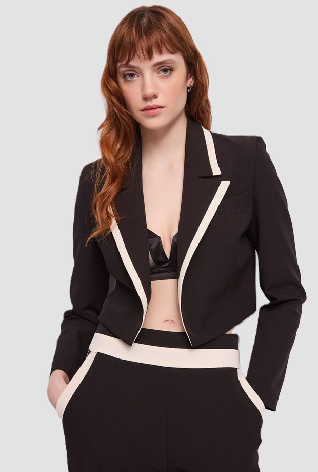 cropped jacket with contrasting black woman profiles