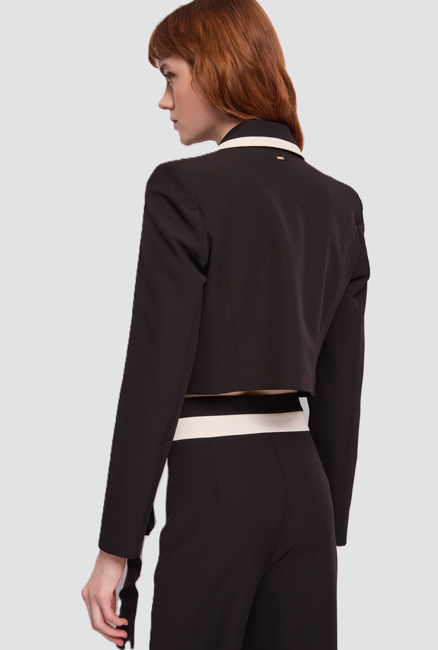 cropped jacket with contrasting black woman profiles