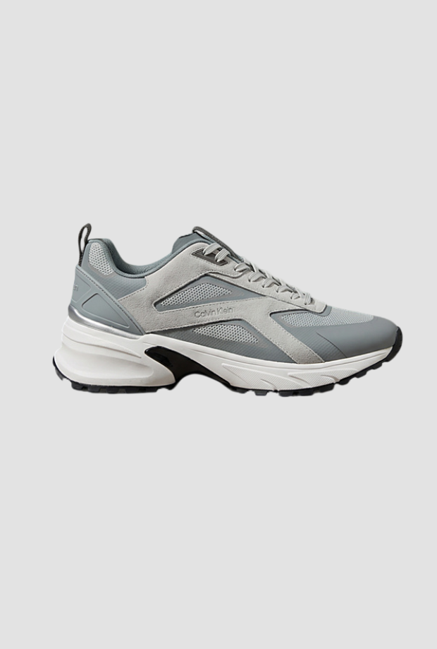 Zapatos corriendo hombre gris luz