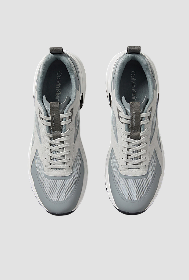 Zapatos corriendo hombre gris luz