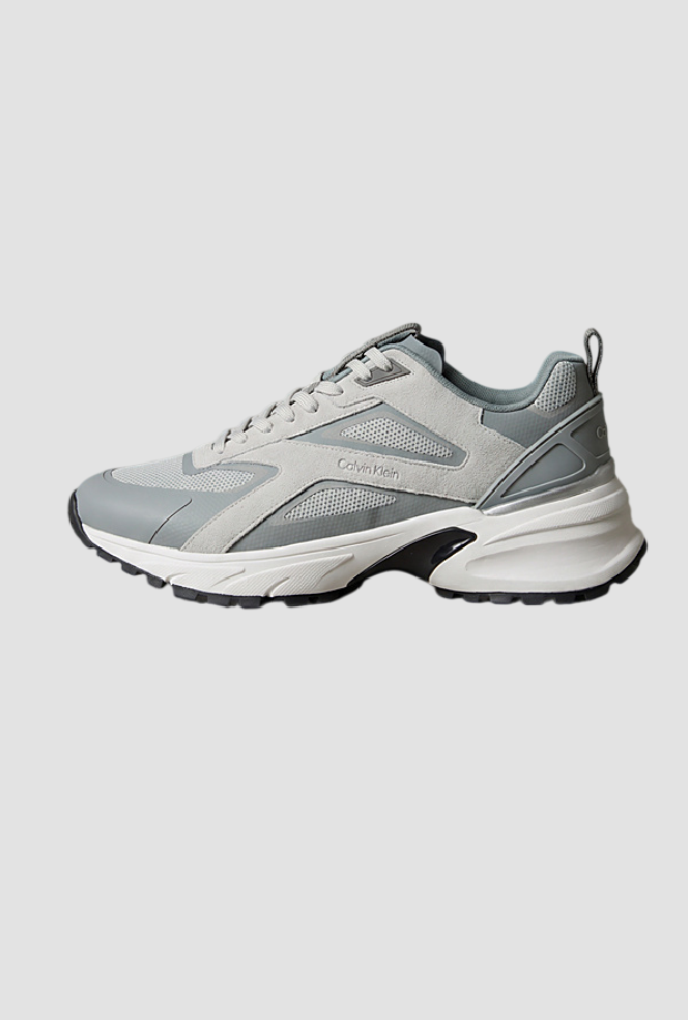 Zapatos corriendo hombre gris luz