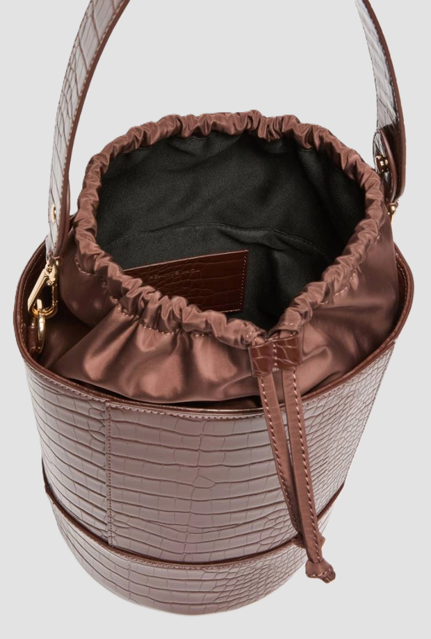 bucket bag woman moron head
