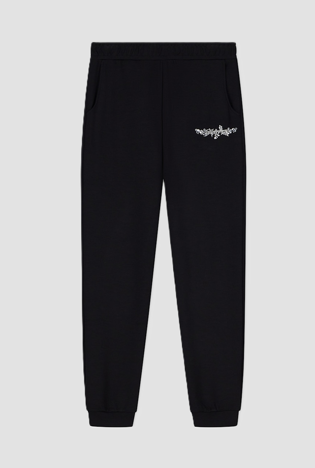 pantalones con logotipo de rhinestone negro
