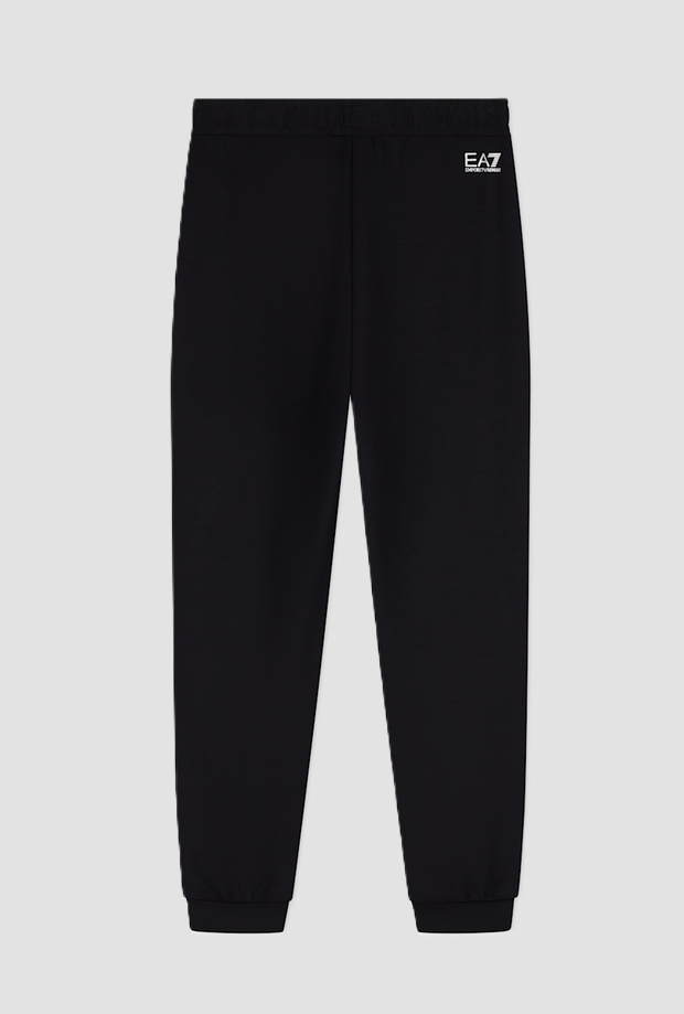 pantalones con logotipo de rhinestone negro