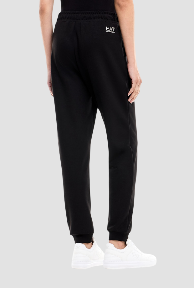 pantalones con logotipo de rhinestone negro