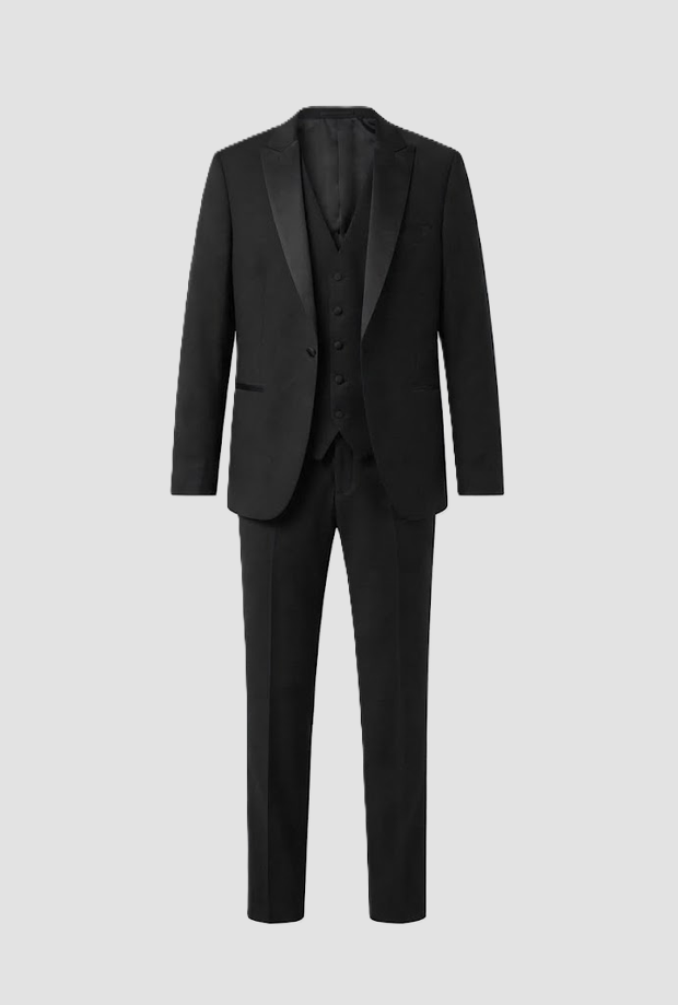 vestido tres piezas de hombre negro